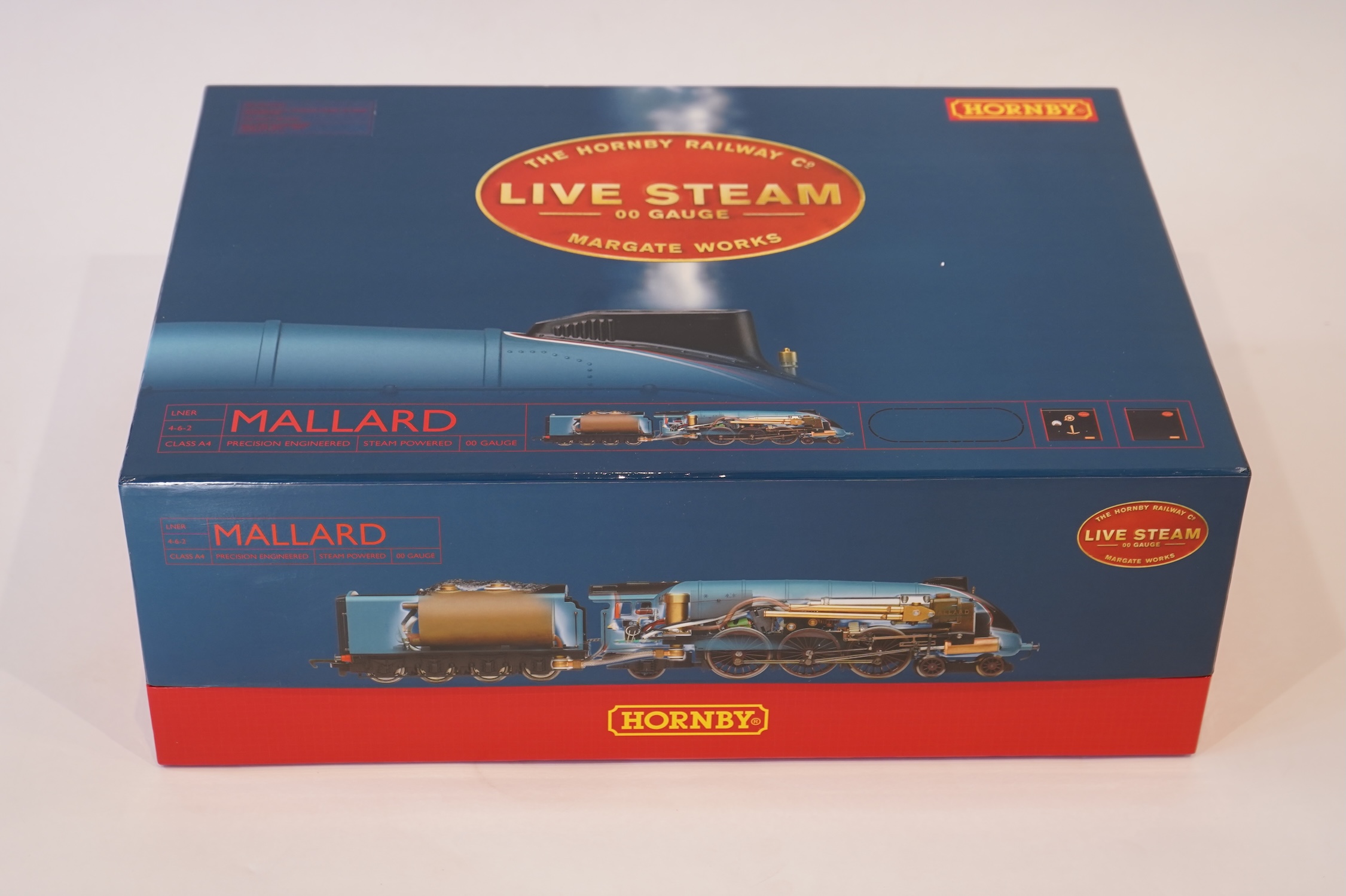 A Hornby Railway Co. 00 gauge live steam train set (R1041), comprising an LNER Class A4 4-6-2 tender locomotive, Mallard 4468, and accessories, including controllers, etc.